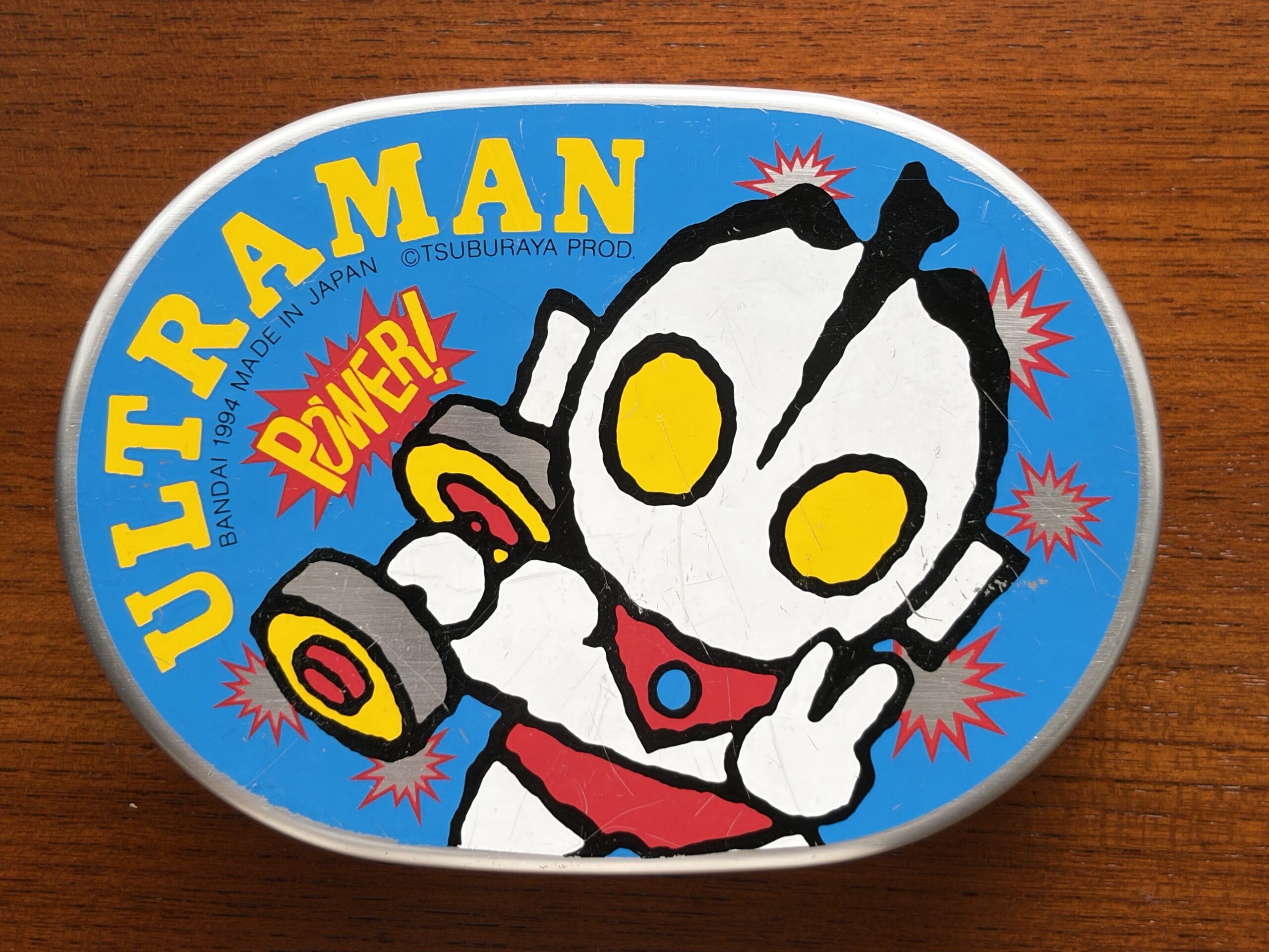 ウルトラマンの絵が描かれた、アルミのお弁当箱のふた